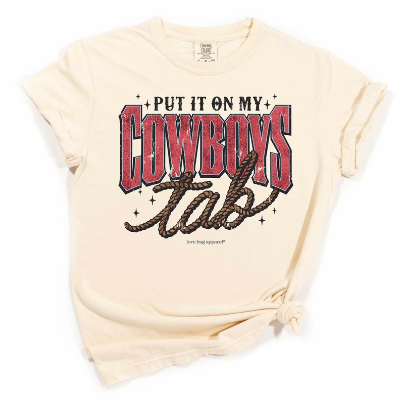 Put It On My Cowboy’s Tab Short Sleeve T-Shirt in Ivory